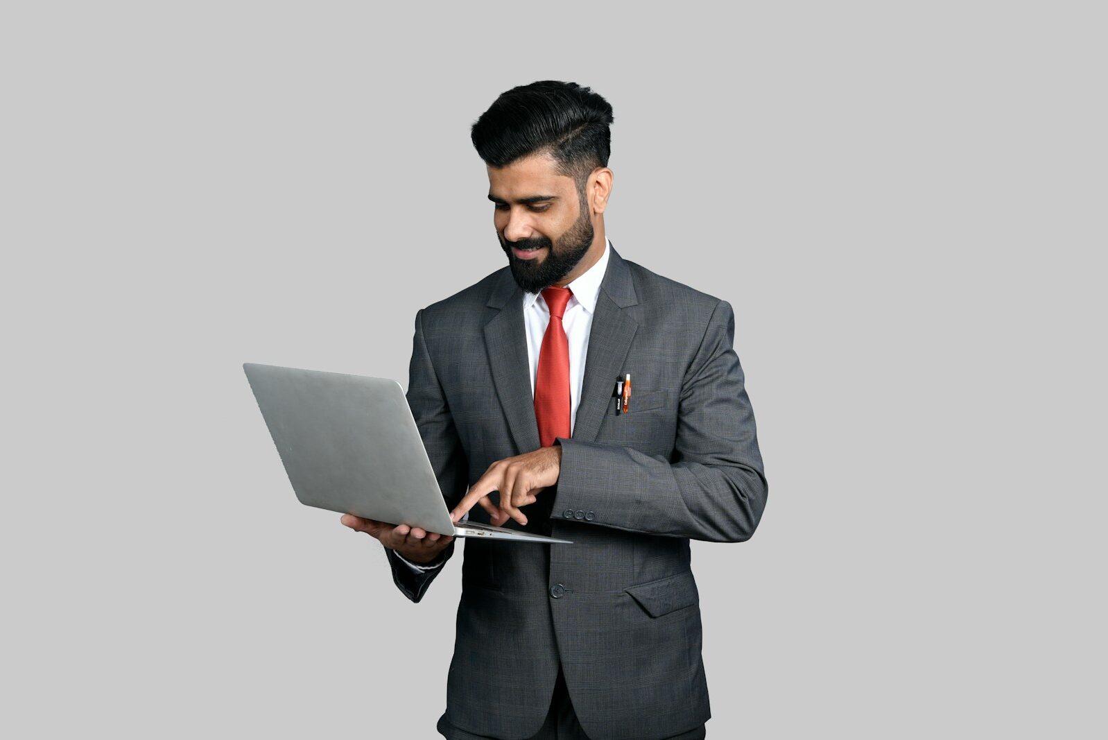 a man holding a laptop